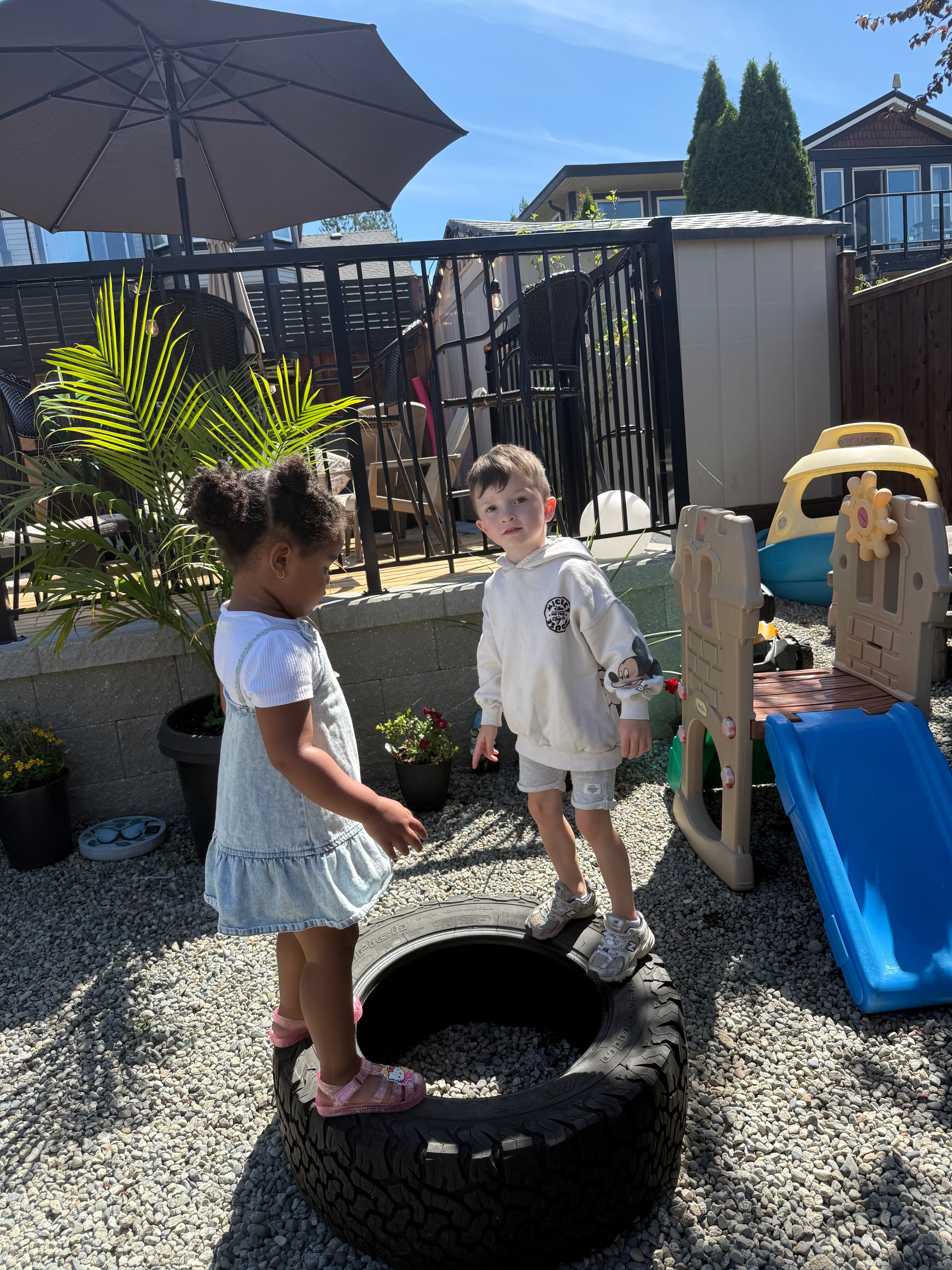 Children playing together in a bright daycare classroom
