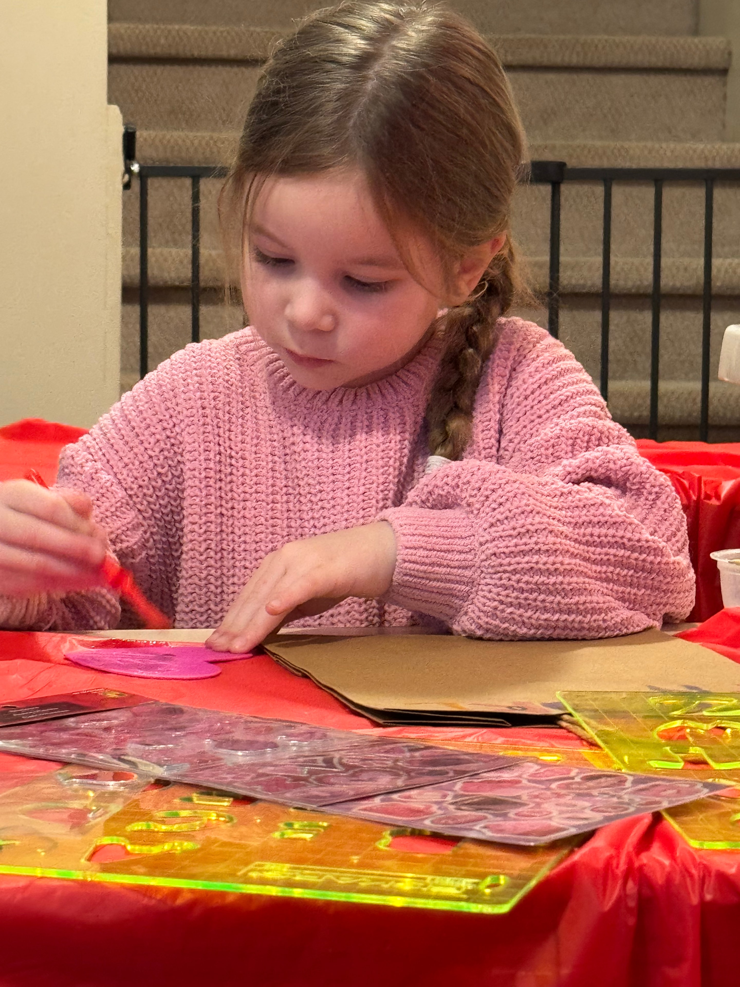 Happy children learning in a colorful daycare classroom